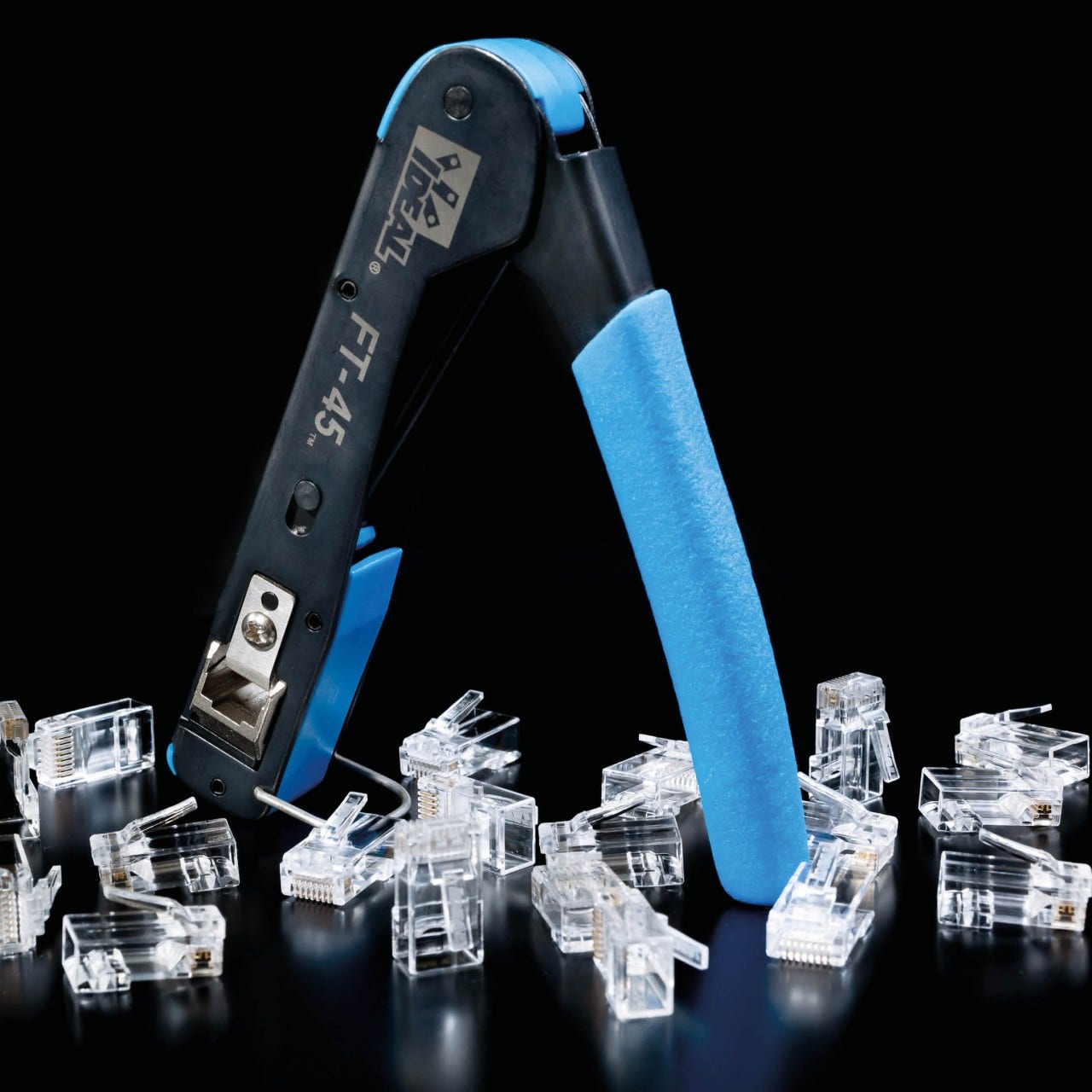 FT-45 modular plug crimp tool displayed with modular plugs