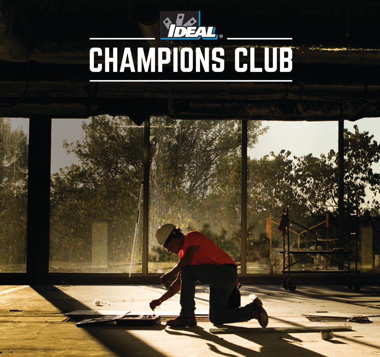 IDEAL Champions Club Man Kneeling while working on ground
